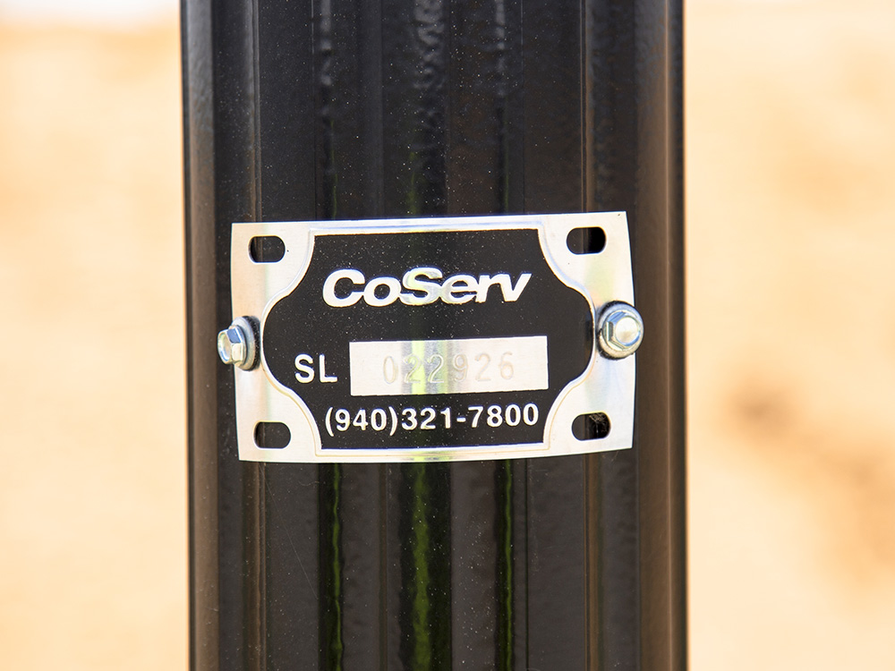 This tag makes it easy to identify if a light is owned by CoServ and report it for repair.