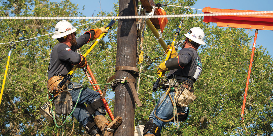 CoServ Journeyman Jared Day and Justin Brown compete in the 2024 Texas Lineman rodeo in Seguin, Texas. Photos by BRIAN ELLEDGE