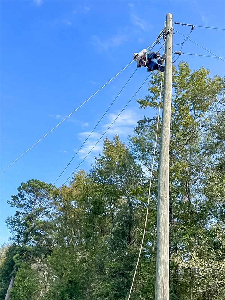 CoServ crews acting as mutual aid in Sandersville, Georgia for Washington EMC helping to restore power after Hurricane Helene went through the area.