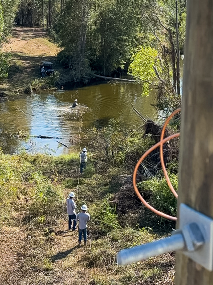 CoServ crews acting as mutual aid in Sandersville, Georgia for Washington EMC helping to restore power after Hurricane Helene went through the area.