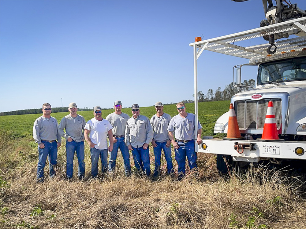 L to R: Austin Clayton, Peyton Johnston, Aaron Armstrong, Mason Horton, Luke Hawkins, Dustin Bailey and Tyler Garrett providing  mutual aid to Washington EMC in Georgia after Hurricane Helene, Oct. 15, 2024.