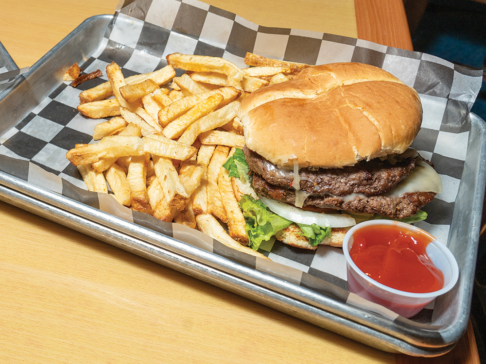 You can find some of the best burgers and BBQ in Justin, Texas at Outlaw Burgers and BBQ.