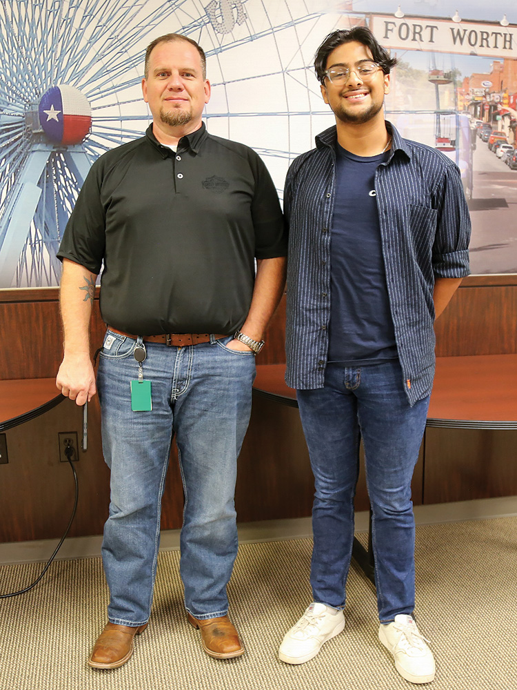 CoServ 2024 Summer Client Services Intern Noel Chacko with Conan Tearney, Client Services Manager.