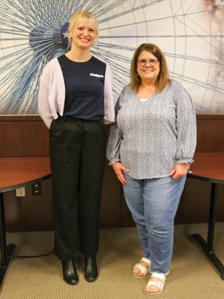 CoServ 2024 Summer Business Intelligence Analyst Intern Eileen Luloh, with Chris Cave, IT Manager Data Analytics and Reporting.